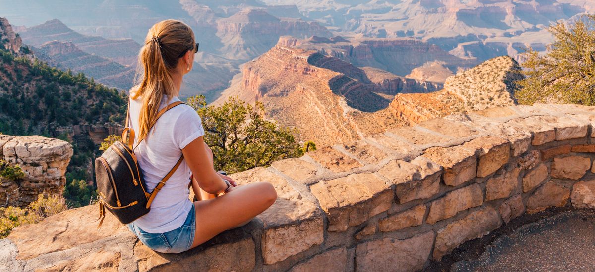 Beautiful girl exploring Grand Canyon village in Arizona, USA.