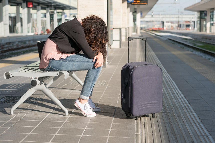 Young black woman waiting for the train