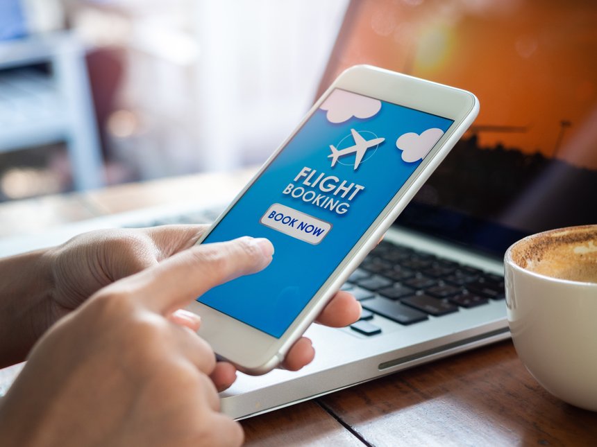 Flight booking online with smartphone.