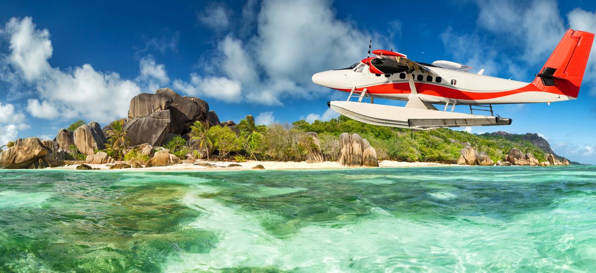 Seaplane with Seychelles island