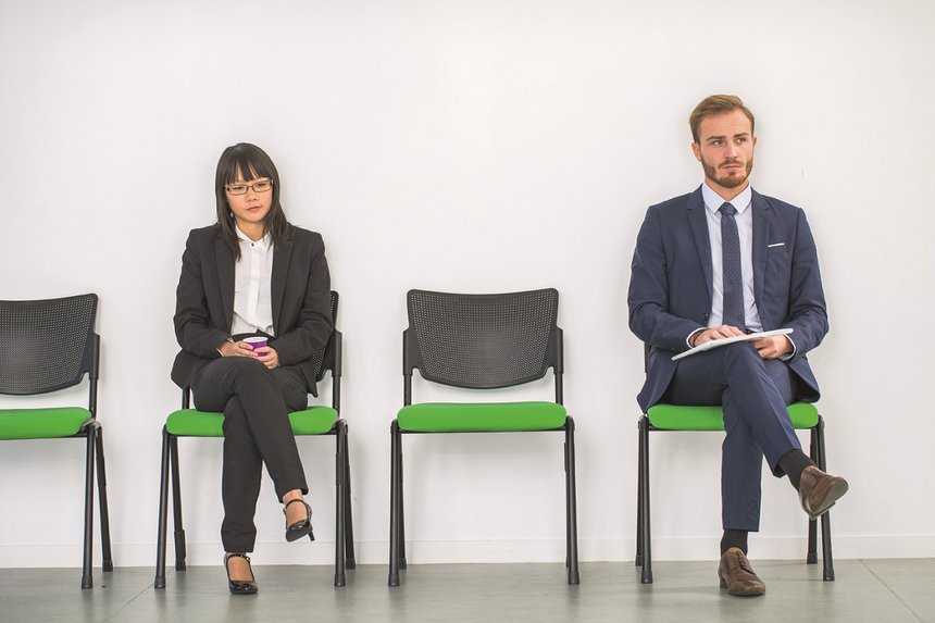 Stressed business people waiting for job interview
