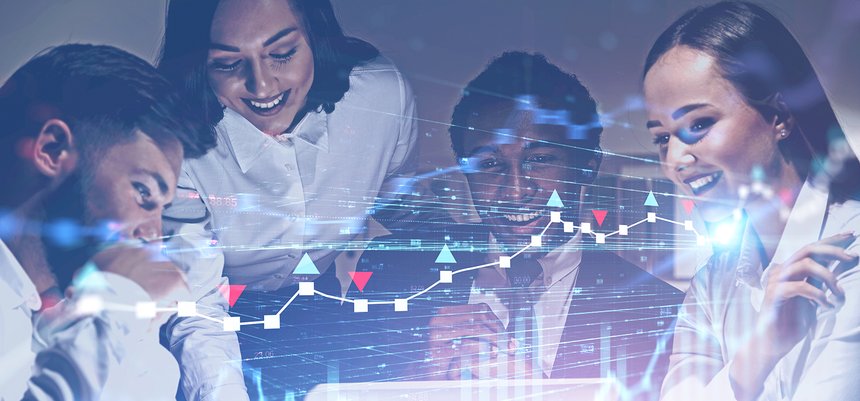 Happy business team in office, forex graphs