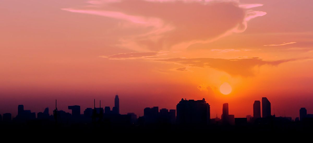 Website header or banner design of sunset in the city panoramic 