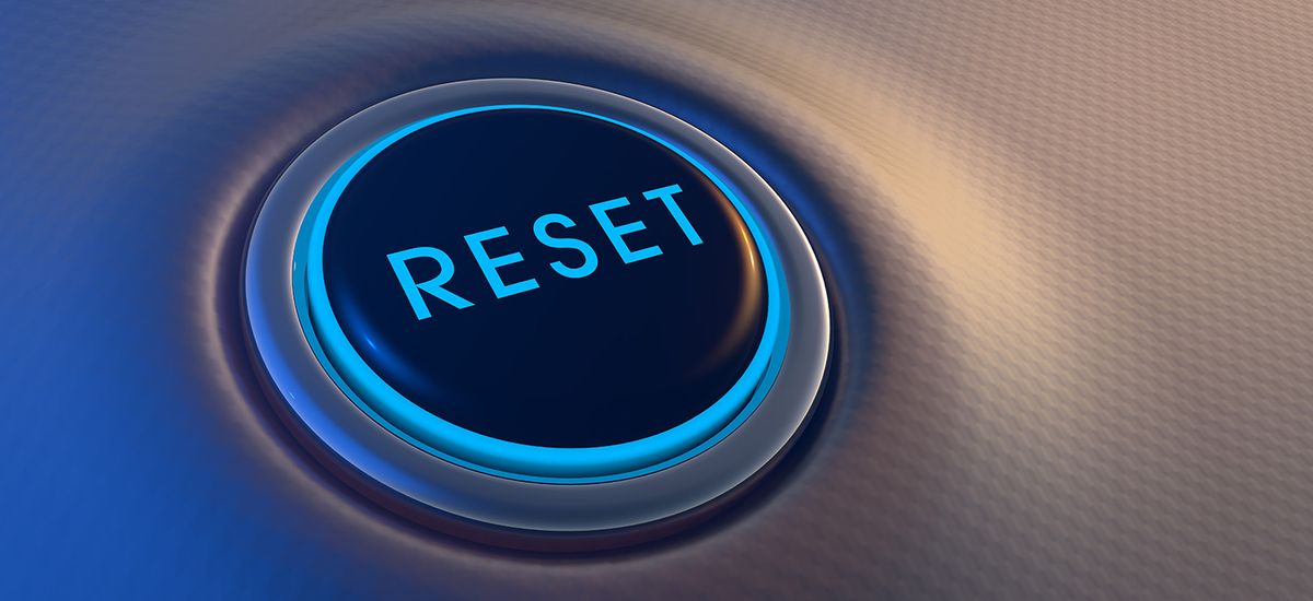 Blue glowing reset button on metallic background. 3D rendering