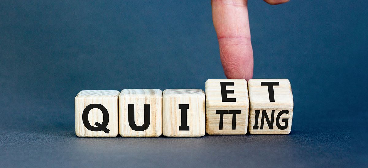 Quiet quitting symbol. Concept words Quiet quitting on wooden cu