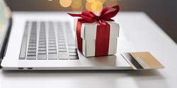 Shopping online during holidays. Ordering Christmas gifts. Using
