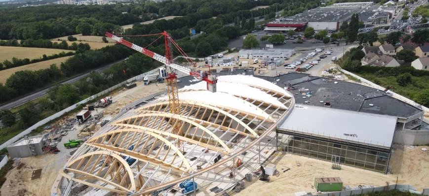 Une piscine pour les JO avec une charpente en lame