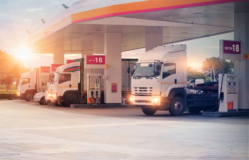 Trucks refueling in petrol station, Transportation vehicle, Busi