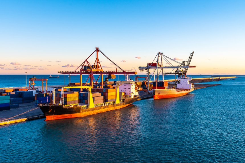 Loaded cargo merchant ships/ bulk container vessels docked at te